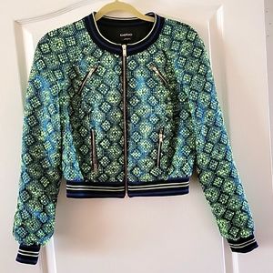 Bebe jacket. Size 10.Green color. 4 zippers pockets.